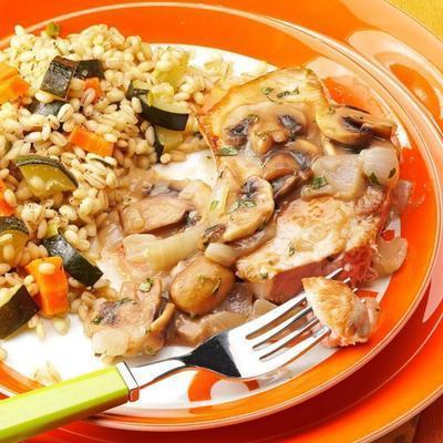 varkenskoteletten met champignons en dragon saus