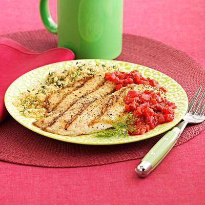 Raspberry-chipotle chutney met gegrilde tilapia en gekruide couscous