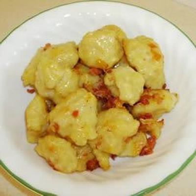 aardappel dumplings met spek en uien