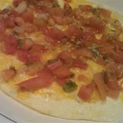 pittige en kaasachtige eieren en tomatenfrittata