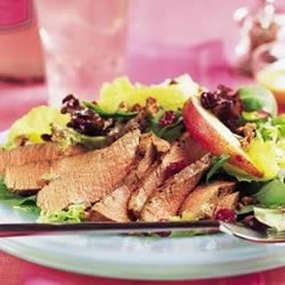 varkenshaas, cranberry en peren salade met honing mosterd dressing