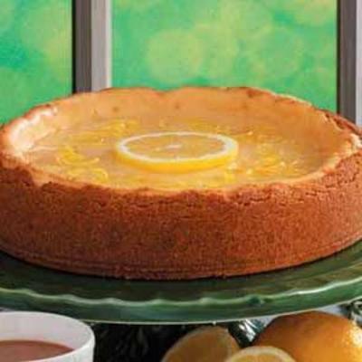 Gouden citroen-geglazuurde cheesecake