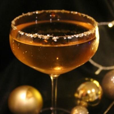 de gouden bubbelcocktail met prosecco, amaretto en glitter