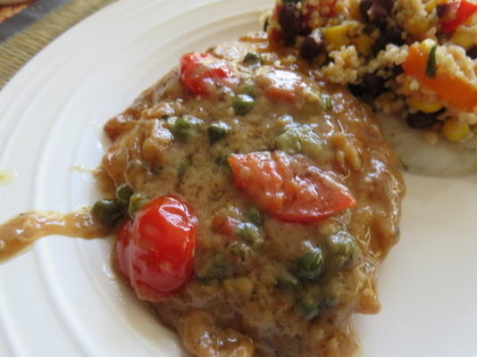 pan gefrituurde tilapia met witte wijn en kappertjes