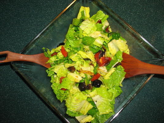 sarasota's salade van geroosterde tomaat, ui en champignons