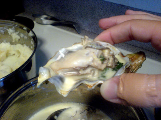 oesters met spinazie en citroensaus