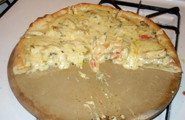 nikki's kip en spinazie Alfredo pizza