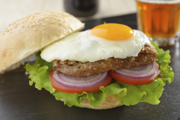 de hamburger met een zonnige kant op