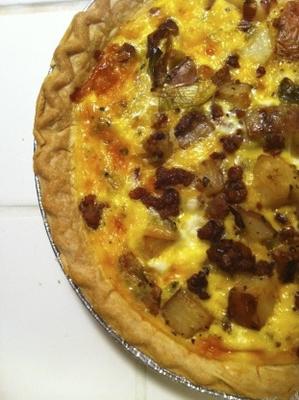 aardappelworst prei quiche met salade van baby spinazie